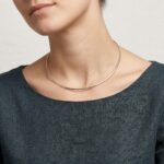 Wit gouden omega spang collier