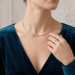 Wit gouden omega spang collier