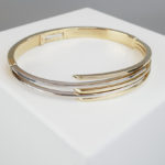 Bicolor gouden Christian slavenarmband