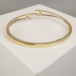 Bicolor gouden Christian slavenarmband