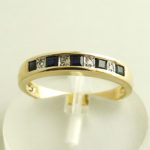 Geel gouden ring met diamant en saffier