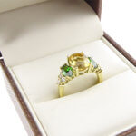 Gouden ring met citrien en smaragd
