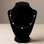 Gouden collier met parels