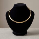 Gouden spang omega collier