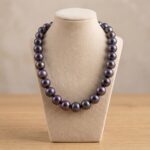 Christian antraciet parel collier