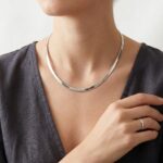 Bicolor gouden omega collier plat