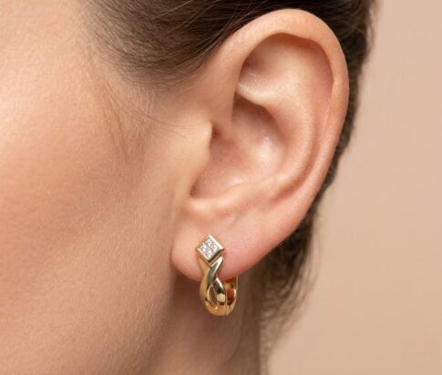 Geel gouden oorclips met diamant