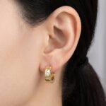 Christian gouden oorclips met diamant