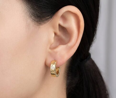 Christian gouden oorclips met diamant