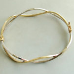 Christian bicolor gouden slavenarmband