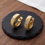Christian gouden oorclips met diamant