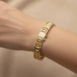 Christian gouden bicolor schakelarmband