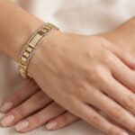 Christian gouden bicolor schakelarmband