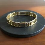 Christian gouden bicolor schakelarmband