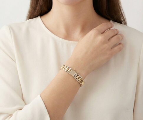 Christian gouden bicolor schakelarmband