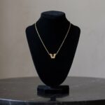 Gouden ketting met V hanger