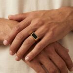 Geel gouden zegelring met onyx