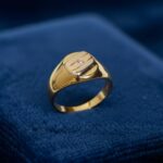 Gouden tricolor cachet ring met diamant