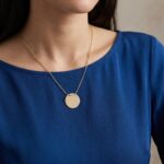 Gouden ketting met ronde hanger