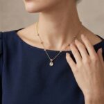 Gouden zirkonia peer hanger