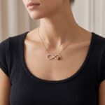 Gouden zirkonia Infinity lieveheersbeestje hanger