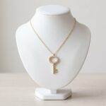 Gouden zirkonia sleutel hanger