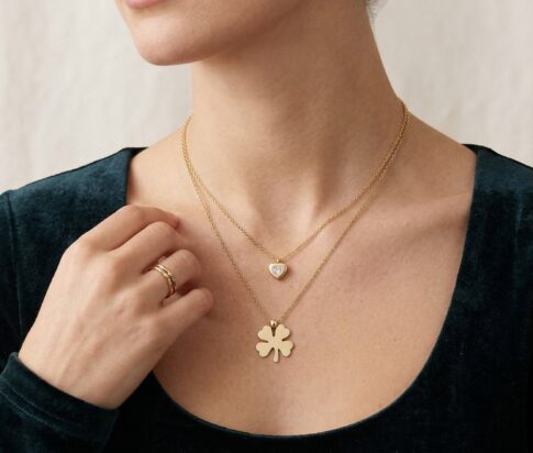 Gouden hart en klaver hanger