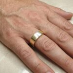 Gouden zegelring met onyx en diamanten