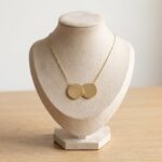 Gouden ketting met dubbele ronde hanger