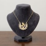 Gouden zirkonia baby en moeder hanger