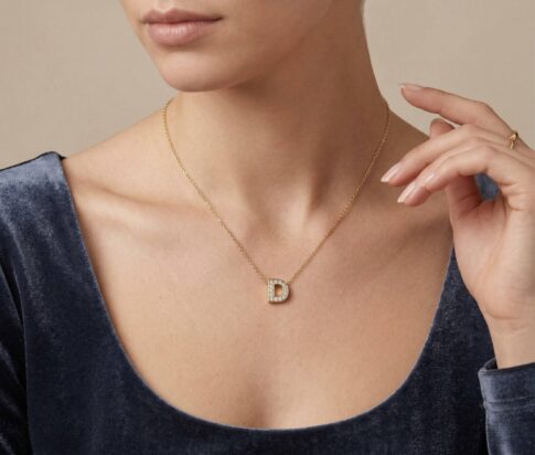 Gouden ketting met D zirkonia hanger