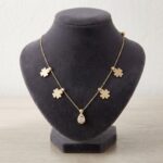 Gouden klaver en zirkonia hanger