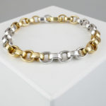 Bicolor gouden schakelarmband