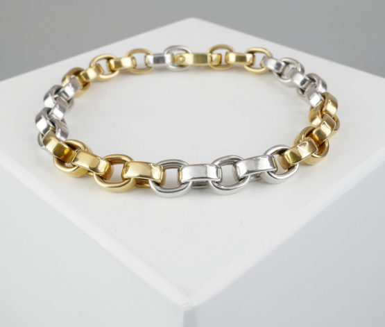 Bicolor gouden schakelarmband