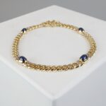 Gouden armband met diamant en saffier