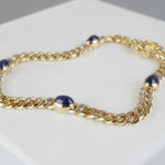 Gouden armband met diamant en saffier