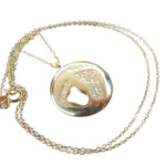 Gouden zirkonia baby hanger