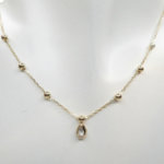 Gouden zirkonia peer hanger