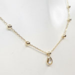 Gouden zirkonia peer hanger