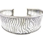 Zilveren zebra klemarband