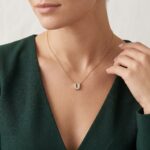 Gouden ketting met U zirkonia hanger