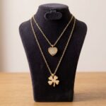 Gouden hart en klaver hanger