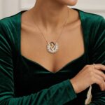 Gouden zirkonia baby en moeder hanger