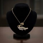 Gouden zirkonia zwaan hanger