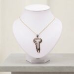 Bicolor gouden zirkonia sleutel hanger