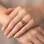 Gouden ring met citrien en smaragd
