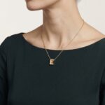 Gouden ketting met E hanger