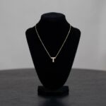 Gouden ketting met T zirkonia hanger
