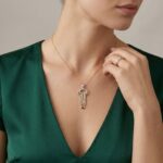 Bicolor gouden zirkonia sleutel hanger