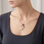 Gouden zirkonia sleutel met slot hanger